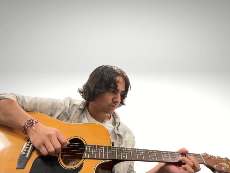 Zain Bari with Guitar Zain Bari
